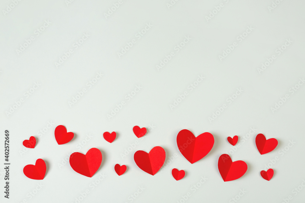 
Composition with red paper hearts. Background with copy space for Valentine's Day.