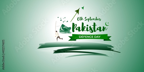 Vector illustration of Pakistan defence day, 6th september, pakistan flag, soldier with rifle and helmet, airforce craft and army tank. photo