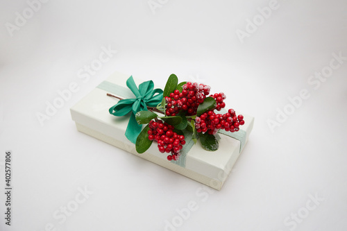 gift wrapping with coniferous branches and attachments