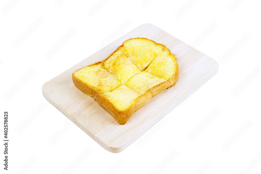 Milk butter toast on a wooden board isolated on white background.Toast bread