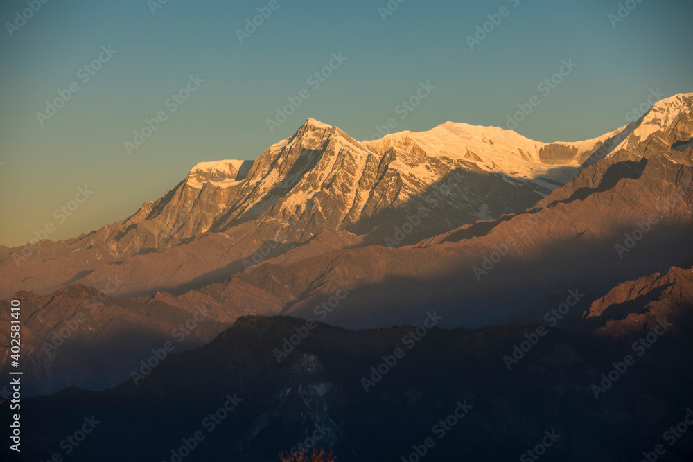 Himalayan mountain Dhaulagiri peak during sunrise in Nepal.