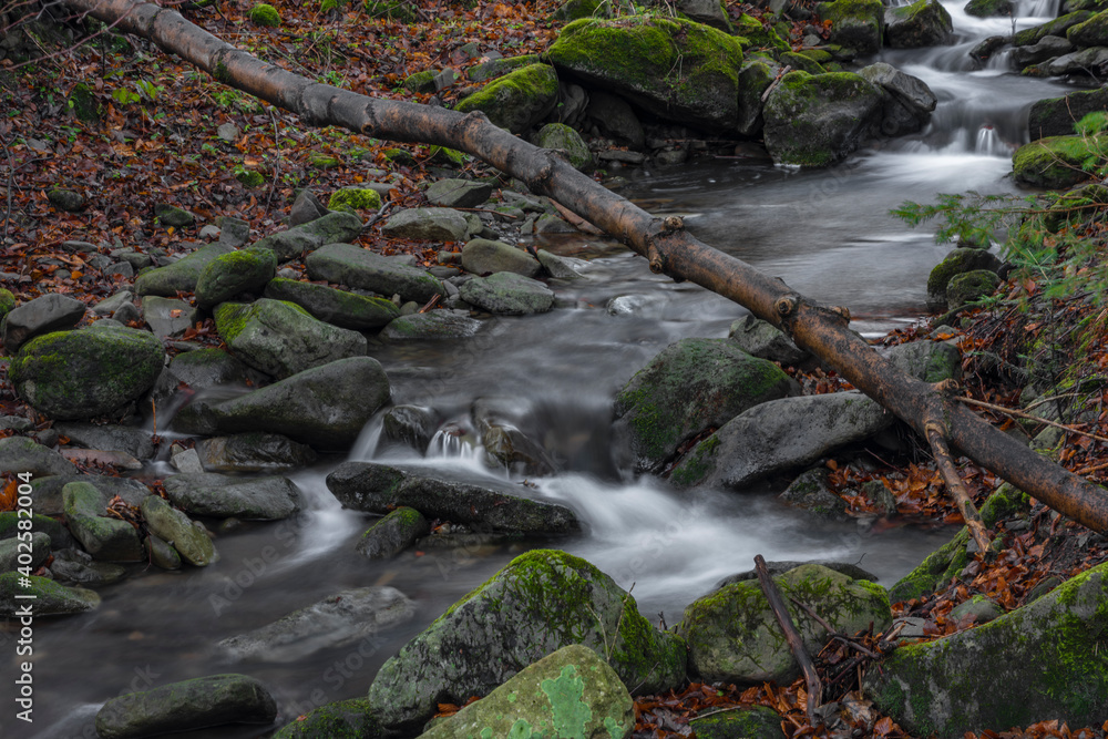 Fototapeta premium Waterfall on Bucaci creek in Moravskoslezske Beskydy mountains in winter day