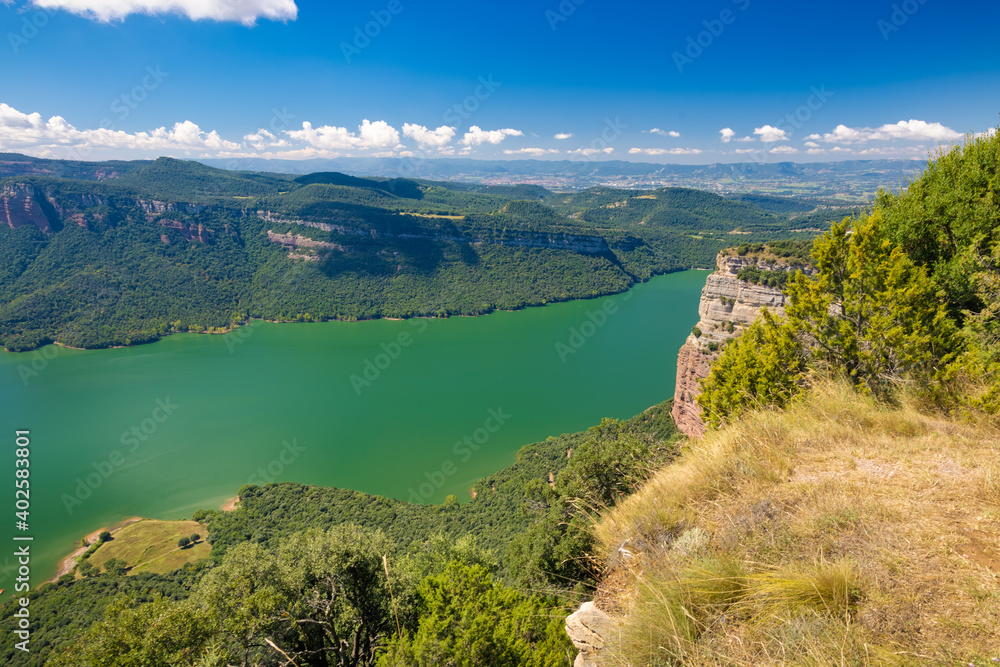 Panoramic view of the western area of the Sau reservoir from the cliffs of Tavertet, Catalonia, Spain