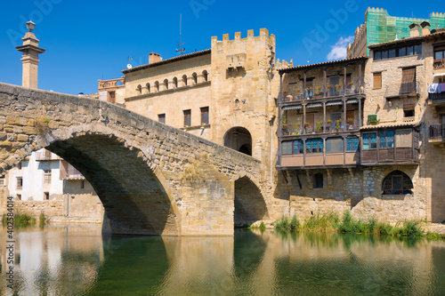 View from Rio Matarranya the medieval bridge that gives access to the historic center of Valderrobres, Aragon, Spain