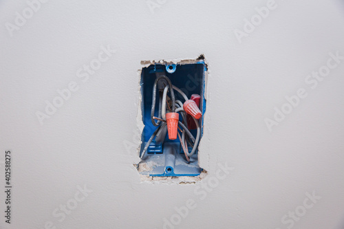1-Gang Blue Plastic Switch Outlet Electical Box on unfinihsed walll