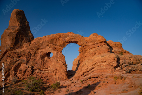 rock formation with two large holes in it