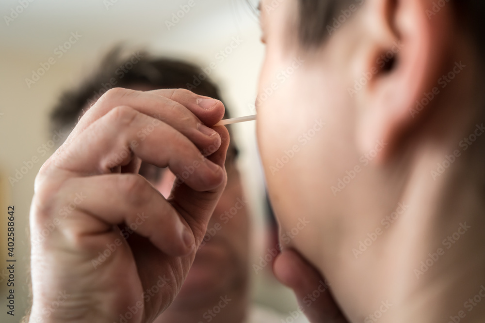 Obraz premium Home antigen testing with nasal swab 