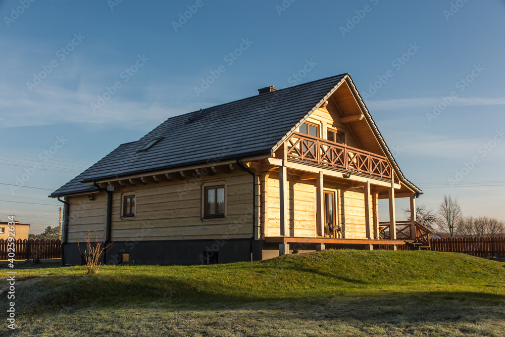 Log house made of fir logs Log house made of fir logs
