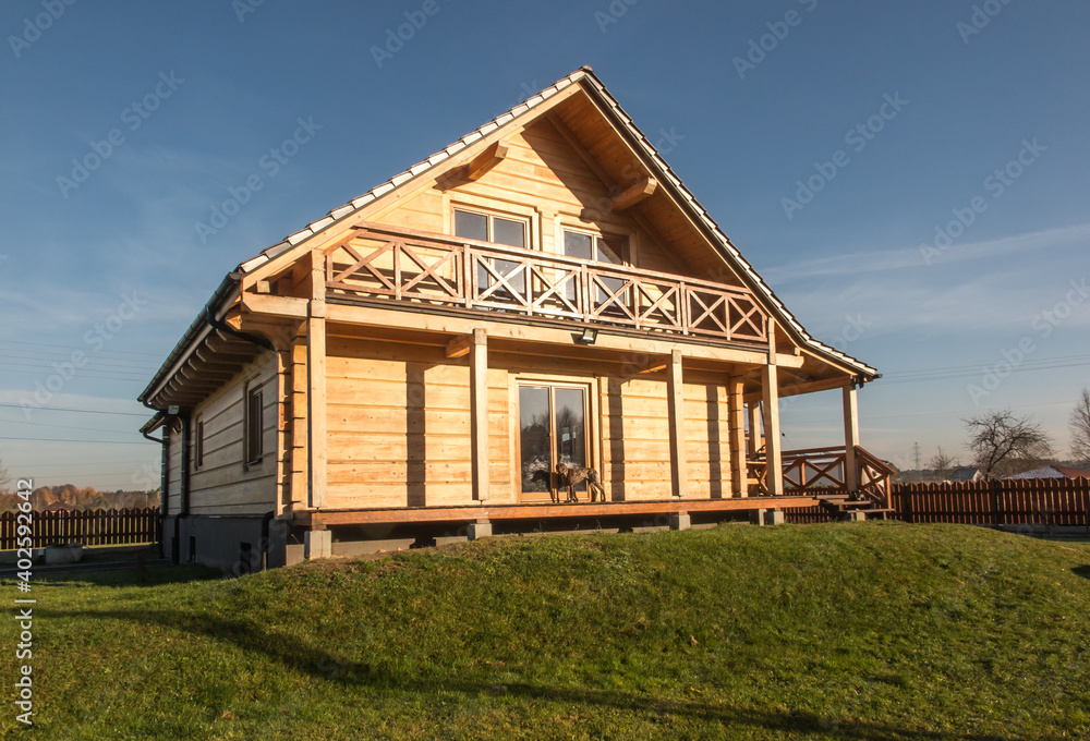 Log house made of fir logs Log house made of fir logs