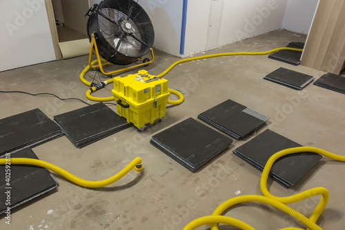 Fotografie Drying a concrete floor under a fabric covering