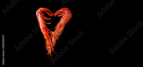 Two heart-shaped large langoustines. Seafood healthy. Top View with Copy space. 