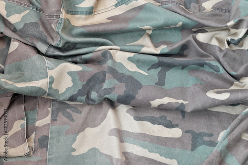 Camouflage background texture as backdrop for russian or ussr snipers design projects photo