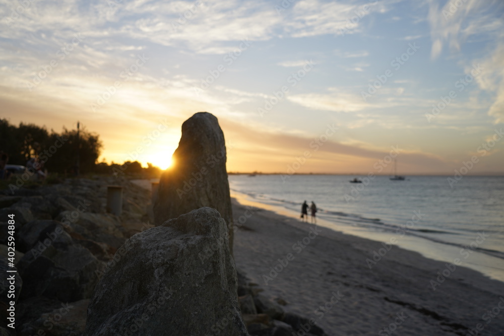 rocks at beach at sunset
