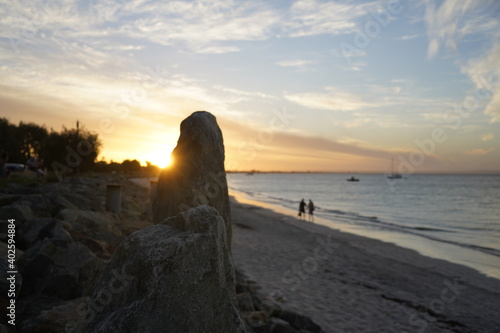 rocks at beach at sunset