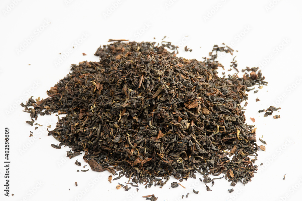 pile of tea leaves on white background