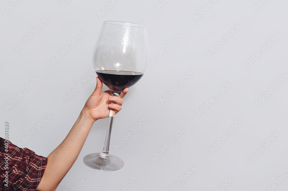 Woman Holding Very Large Glass Of Red Wine Stock Photo, Picture