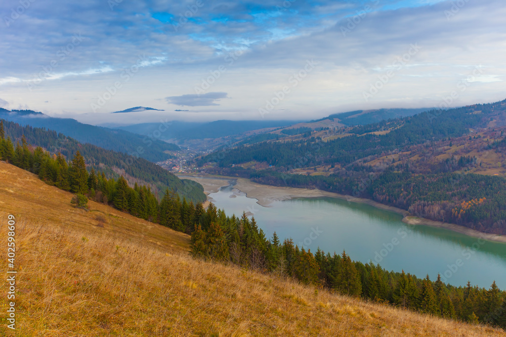 Obraz premium Izvorul Muntelui lake in Romania. Ceahlau mountain in background