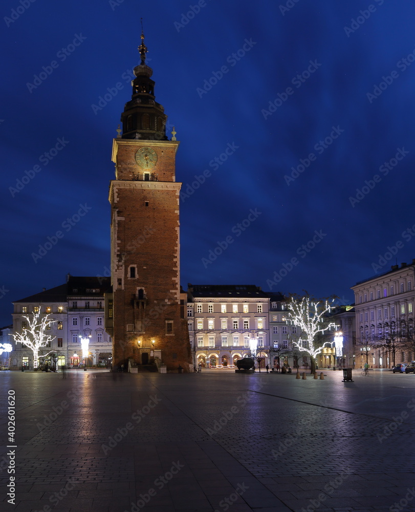 Historical city hall / town hall tower on Main Market Square in Krakow at night