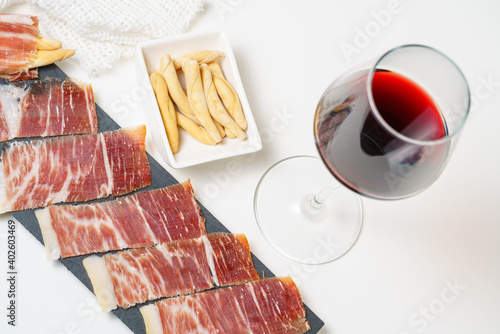 Spanish tapas, iberian loin, sausage. Iberian Acorn Ham and red wine