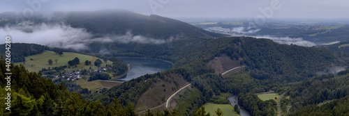 panorama landscape photo of the belgian ardennes of water management a reservoir a river and roads the hilly idyllic village of coo Belgium