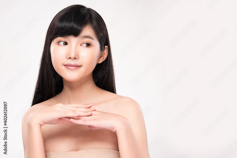 Beautiful Young asian Woman with Clean Fresh Skin, on Pink background, Face care, Facial treatment. Cosmetology, beauty and spa. Asian women portrait Beautiful Young asian Woman with Clean Fresh Skin, on Pink background, Face care, Facial treatment. Cosmetology, beauty and spa. Asian women portrait