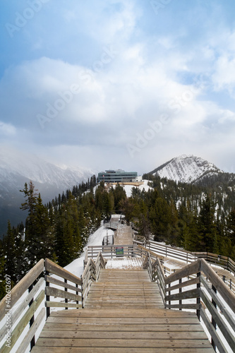 Banff, Canada - december 2020 : View from along the boardwalk on the top of Sulphur Mountain, showing the mountain top terminal and viewing deck