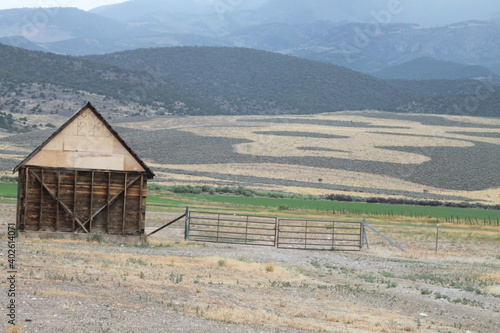 Barn in a patterned Montana field