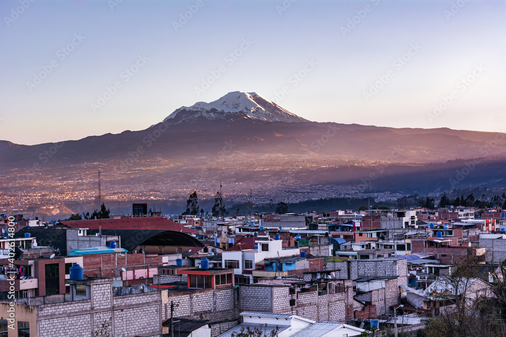 Fototapeta premium Chimborazo volcano with a city