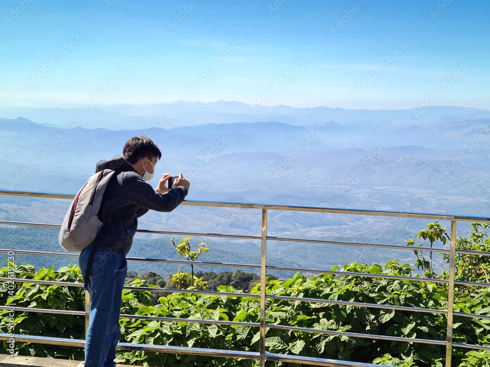 A boy taking a photo
