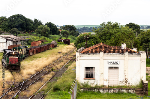 Matao, Sao Paulo, Brazil, February 19, 2013. Locomotives and wagons abandoned in the maneuvering yard of the Matão Railway Station, in Matao city, Sao Paulo state, Brazil