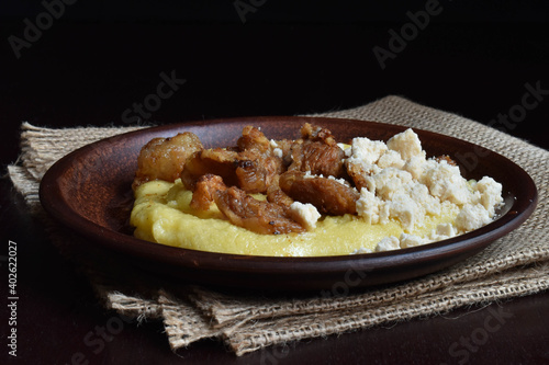 Banush, corn grits porridge with feta cheese and cracklings