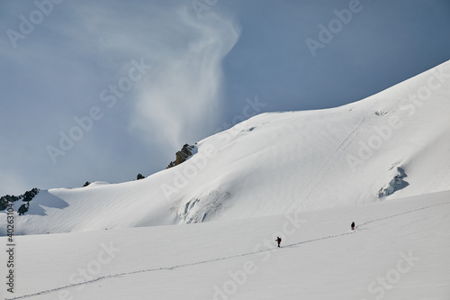 climbers walking on glacier