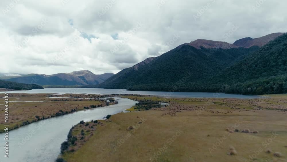 New Zealand lake and mountains, gliding and tranquil aerial view New Zealand lake and mountains, gliding and tranquil aerial view