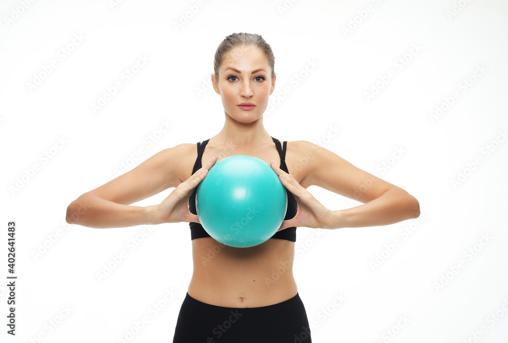 Young fit adult woman doing yoga exercise workout with gymnastics ball. Young fit adult woman doing yoga exercise workout with gymnastics ball.