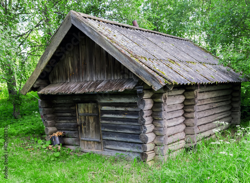 Russian traditional wooden bath old rustic wood house log cabin. © Emoji Smileys People