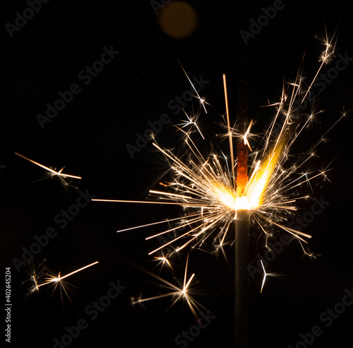 Bengal fire sparkles isolated on black background