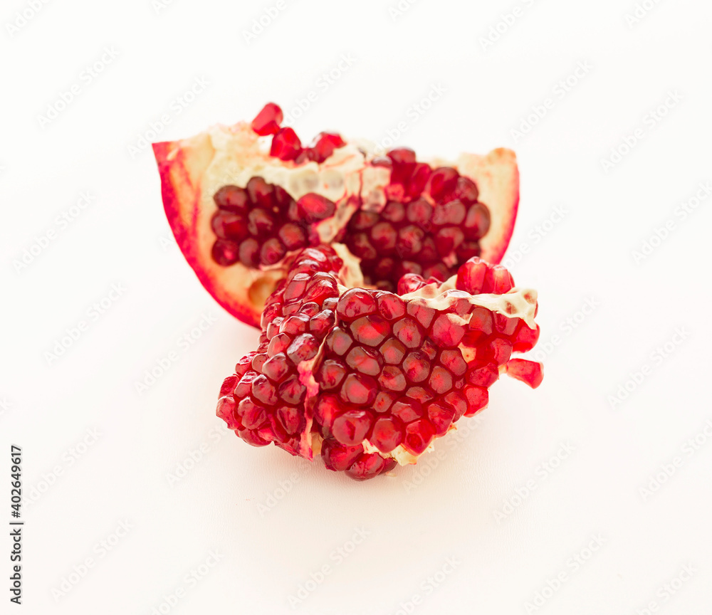 Fresh ripe pomegranate isolated on white background Fresh ripe pomegranate isolated on white background