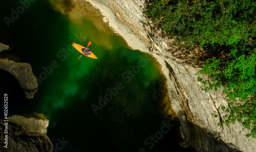 Bild auf Leinwand Man in canoe, Metauro river, Fossombrone, Marche, Italy