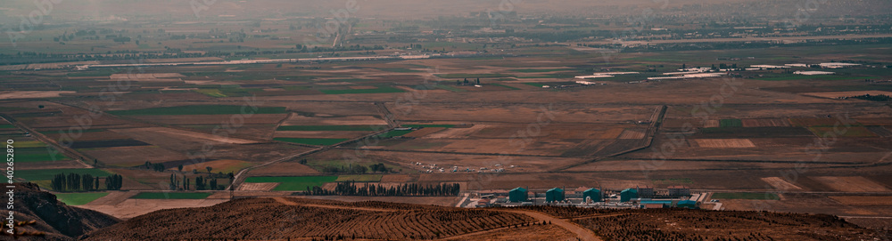 Obraz premium View to agriculture fields in countryside. Rural landscape. Panoramic shot. High resolution sharp photo. Panorama banner.