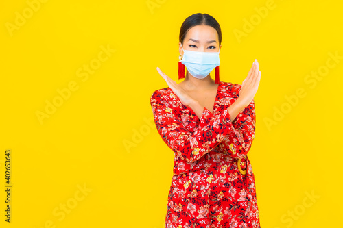 Portrait beautiful young asian woman wear mask for protect corona virus or covid19