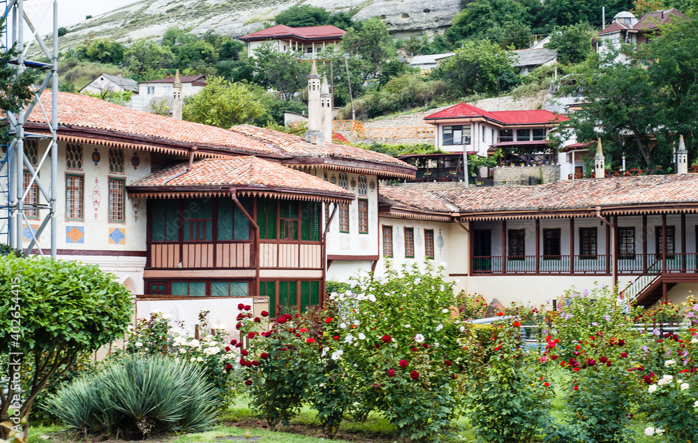 Khans Palace in Bakhchisarai. Ancient Tatar buildings among trees and flowers. Beautiful summer land2018scape. Crimea. Bakhchisarai. July 28, Khans Palace in Bakhchisarai. Ancient Tatar buildings among trees and flowers. Beautiful summer land2018scape. Crimea. Bakhchisarai. July 28,