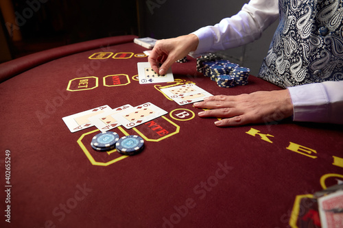 Casino. Black Jack card game. People play cards in a gambling establishment.