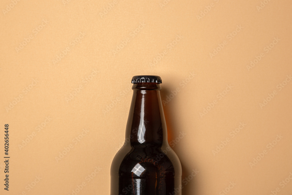 full beer bottle on a monotone background full beer bottle on a monotone background