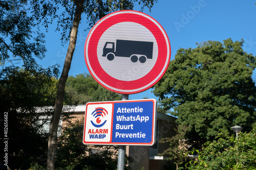 Street Sign Forbidden For Truck And Whatsapp Neigborhood Group At Buitenveldert Amsterdam The Netherlands 31-7-2020 photo