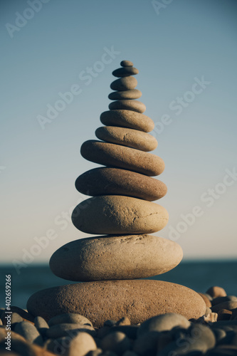 pyramid of stones with sea view