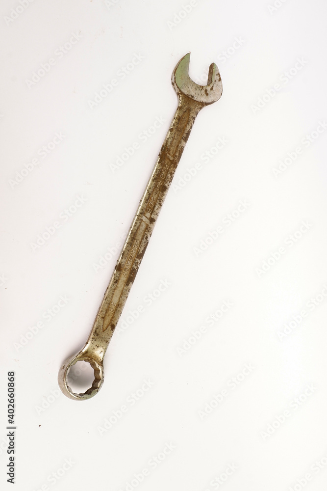 close up of a wrench on a white background close up of a wrench on a white background