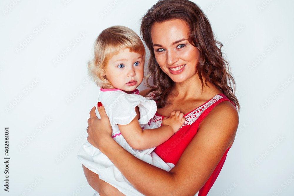 young pretty stylish mother with little cute blond daughter hugging, happy smiling real family, lifestyle people concept young pretty stylish mother with little cute blond daughter hugging, happy smiling real family, lifestyle people concept