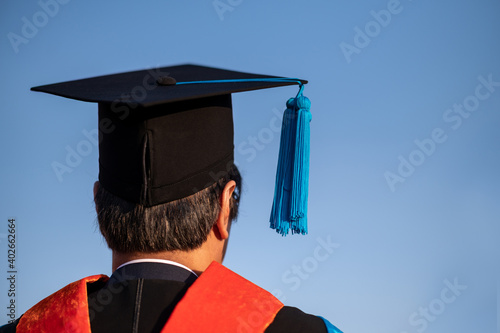 Konstfotografi PhD graduate in black gown University degree