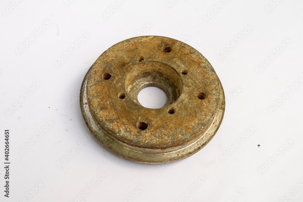 old equipment from grinder machine on a white background old equipment from grinder machine on a white background