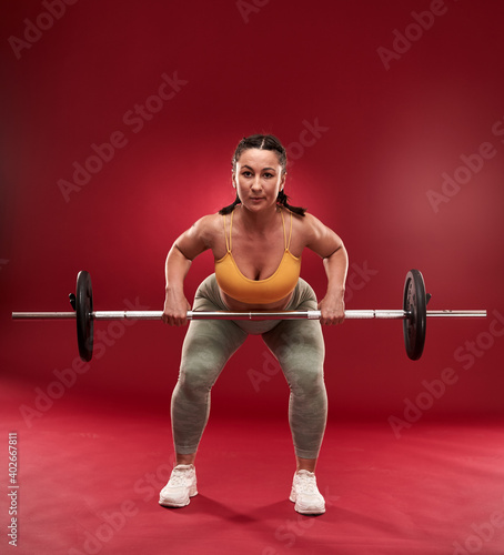 Plus size woman doing fitness exercises